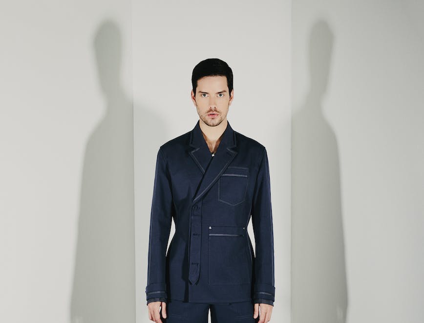 formal wear suit coat blazer jacket adult male man person tuxedo