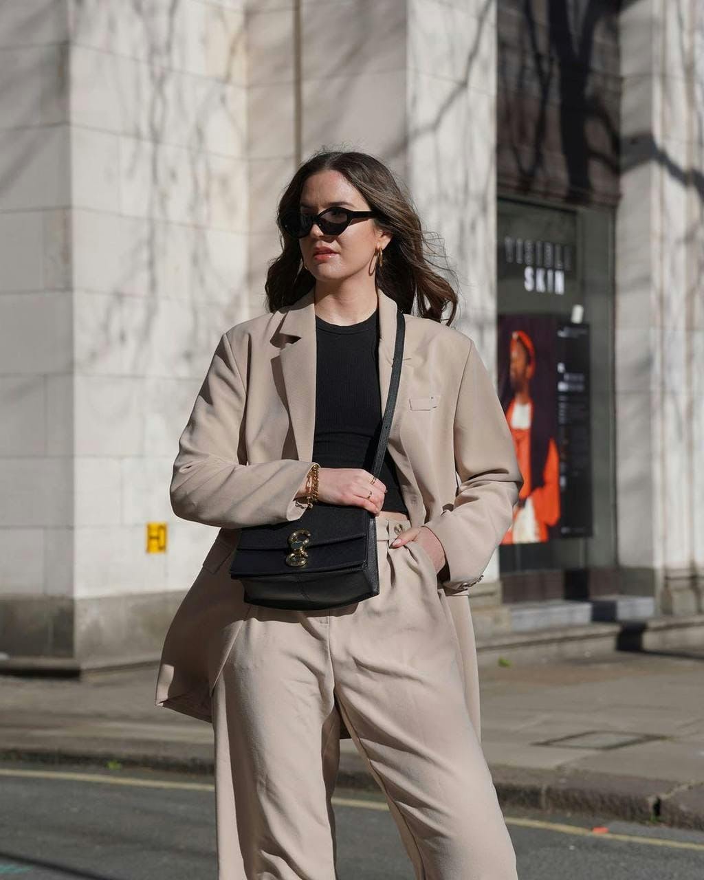 clothing apparel overcoat coat sunglasses accessories accessory person human footwear