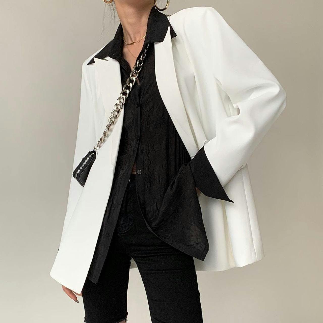clothing apparel sleeve overcoat coat long sleeve female person human suit