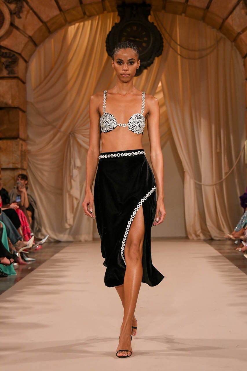 fashion dress clothing swimwear skirt person formal wear runway