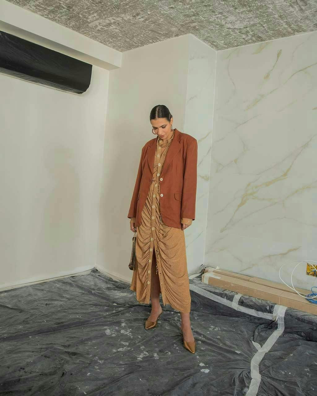 clothing coat person standing adult male man floor