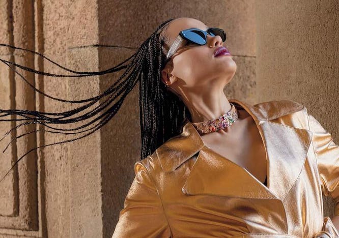 head person face accessories sunglasses adult female woman blouse coat