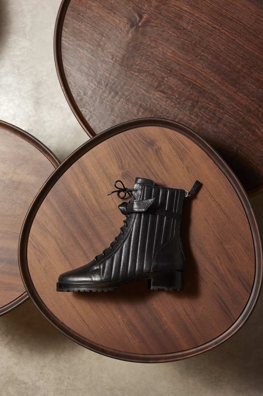 hardwood wood stained wood clothing footwear shoe indoors interior design