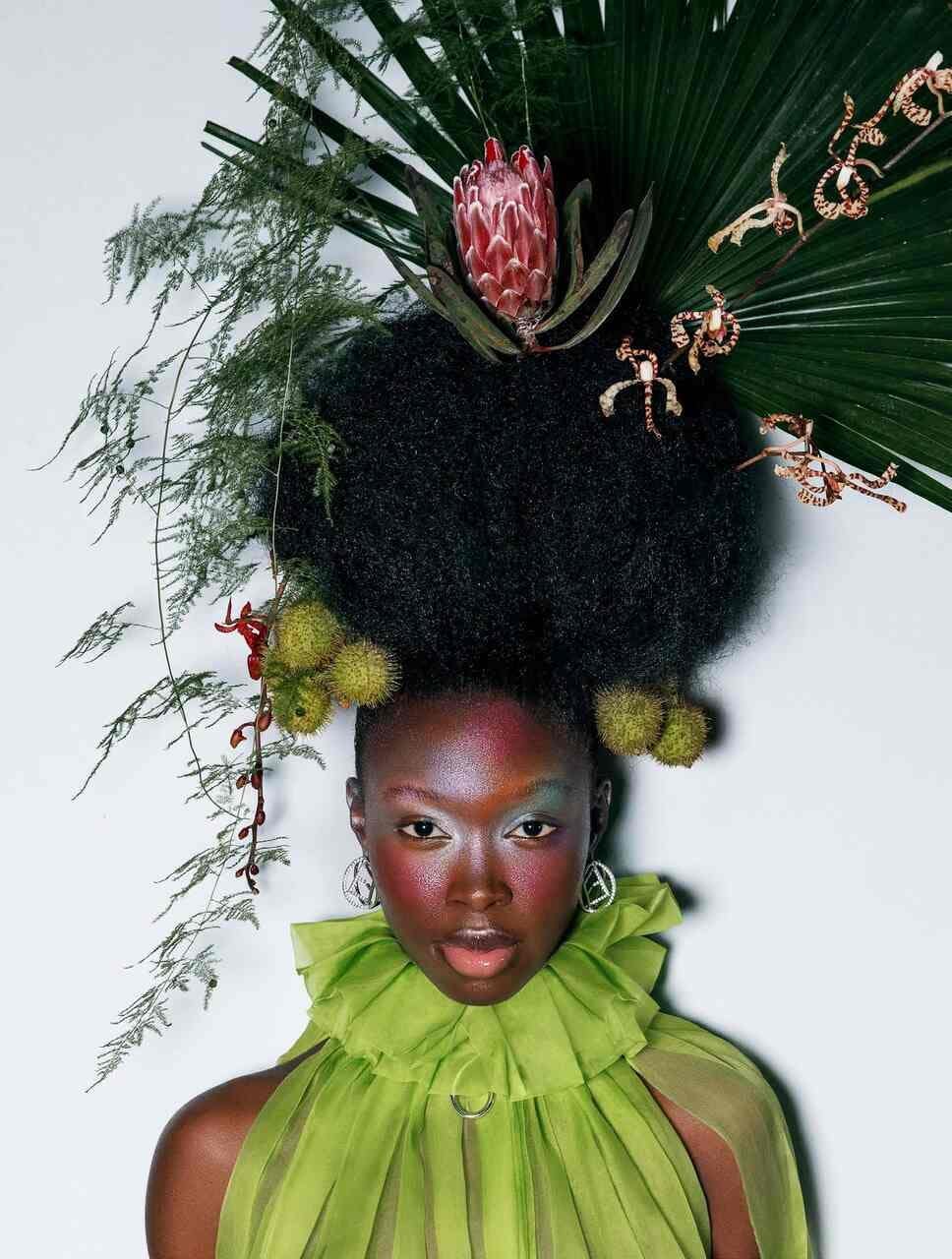 face head person photography portrait black hair hair flower flower arrangement plant