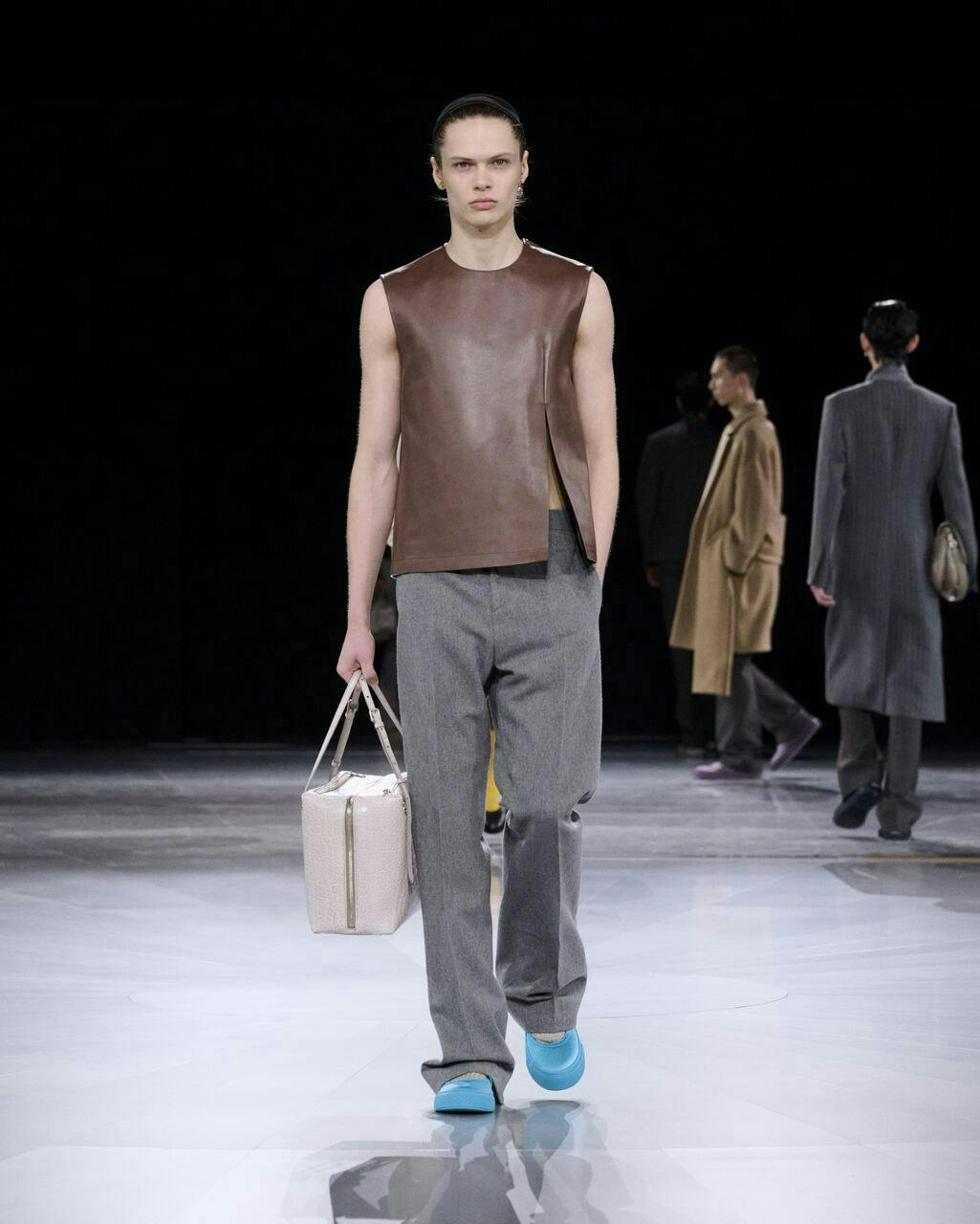 fashion coat adult male man person bag handbag long sleeve shoe