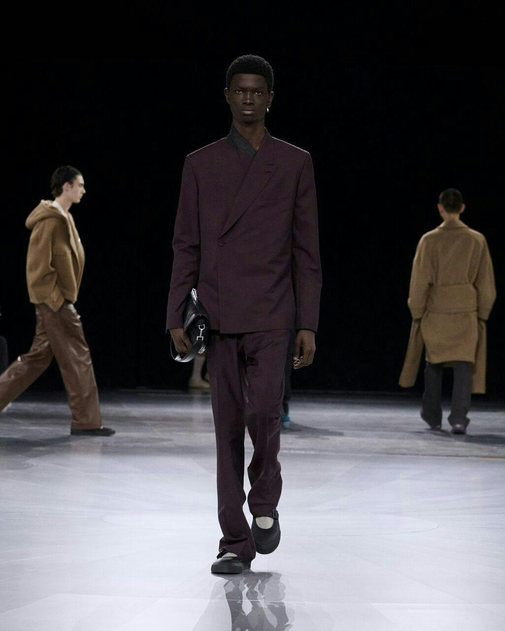 coat fashion adult male man person long sleeve jacket shoe handbag