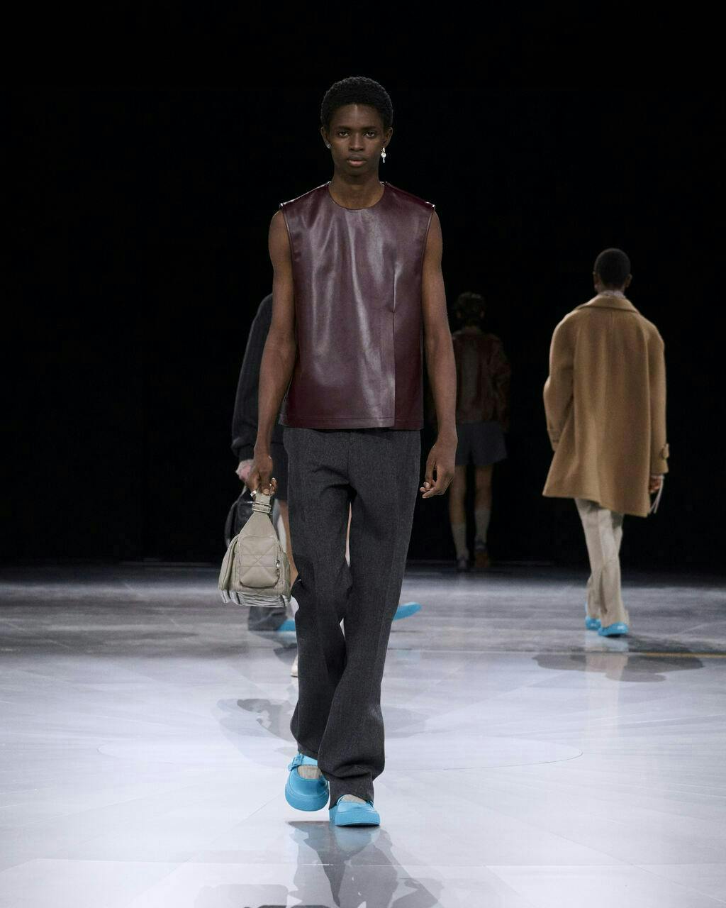 fashion coat adult male man person pants shoe handbag face