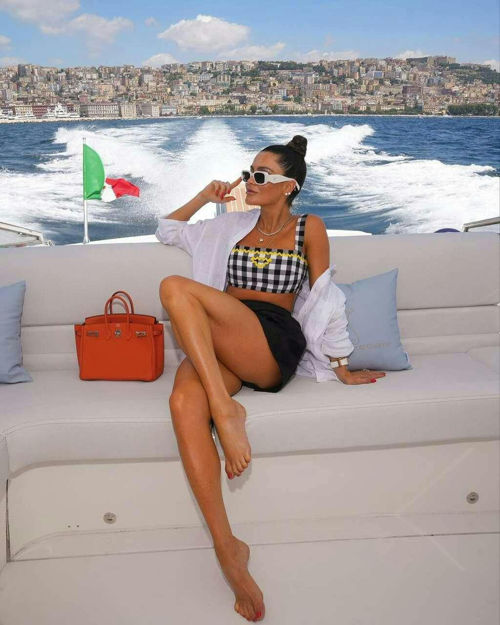 swimwear person portrait accessories sunglasses handbag yacht couch beachwear shorts