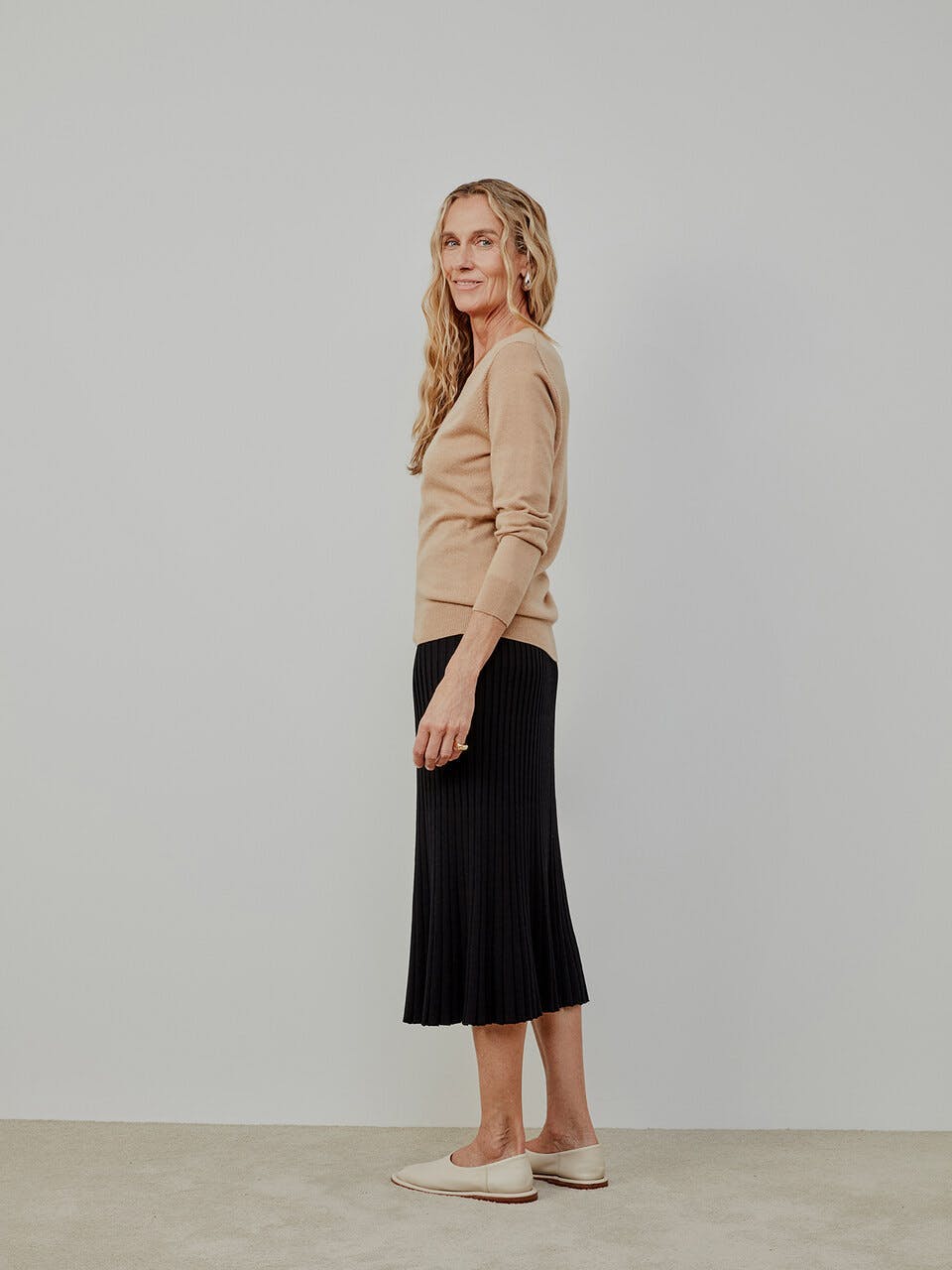 clothing skirt long sleeve sleeve dress person blouse coat miniskirt