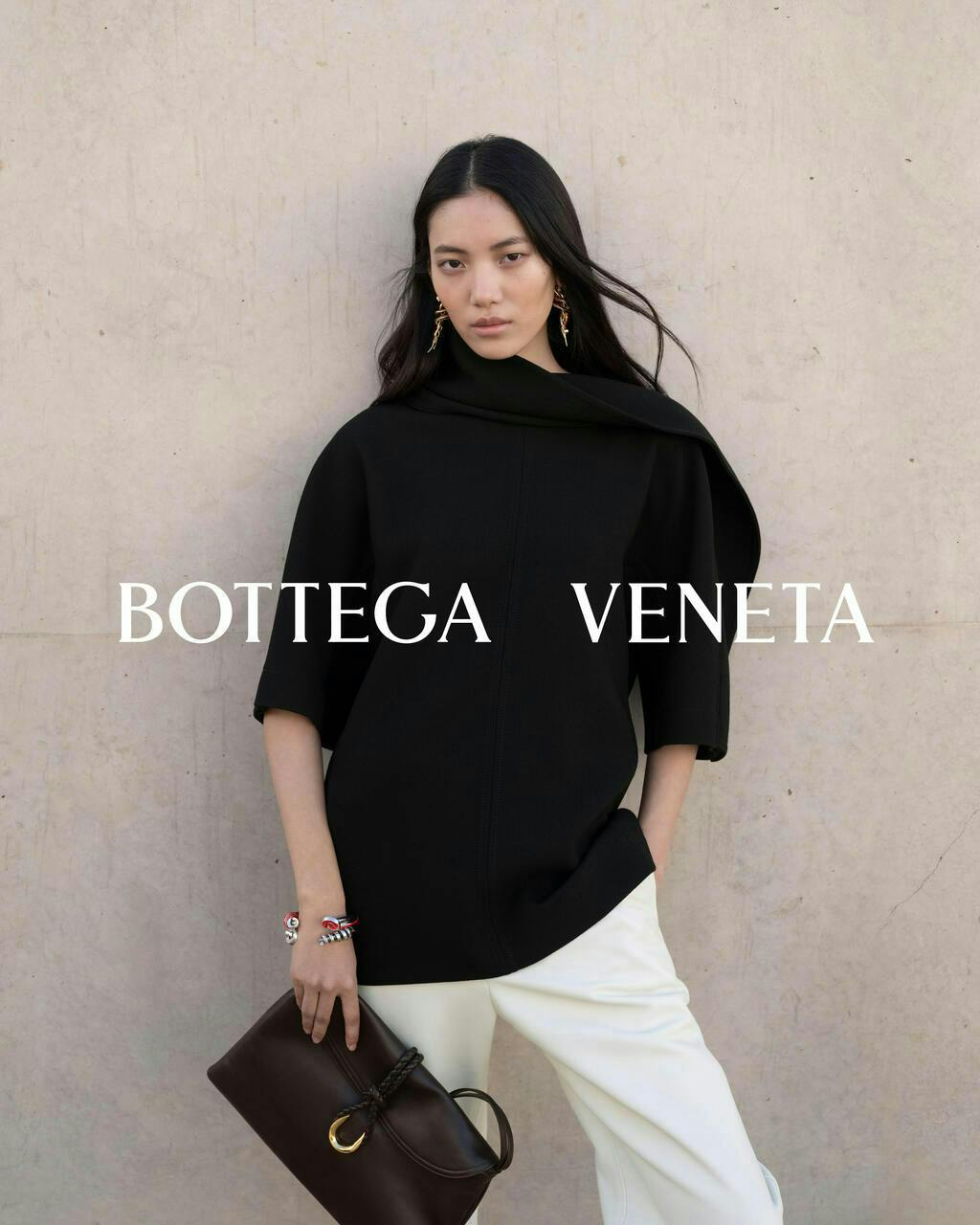 fashion adult female person woman bag handbag cape coat blouse