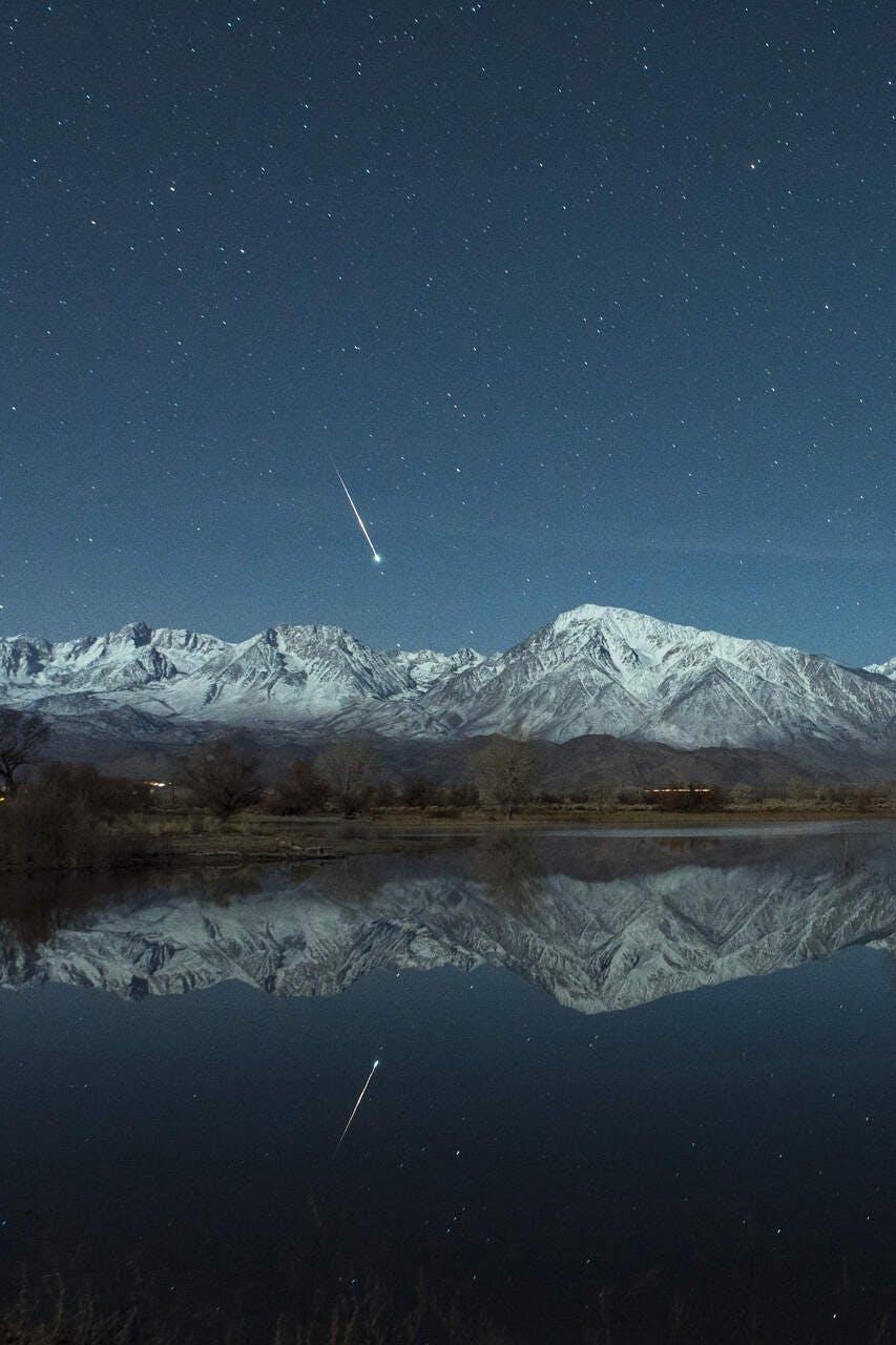 nature outdoors night mountain mountain range scenery peak lake water sky